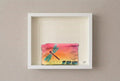 A rectangular fabric pouch with a yellow-to-orange gradient, featuring a painted teal dragonfly and the text 'LET LOVE GROW' in teal and black.